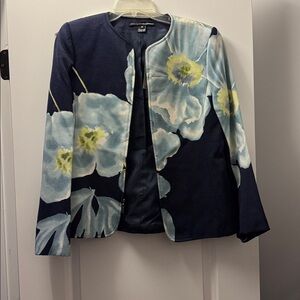 Floral Print Jacket.I received this as a mark down due to a slit on the side.